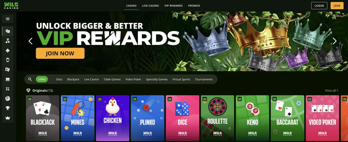 Wild Casino desktop lobby live screenshot showing VIP Rewards hero banner with crown imagery and 9 Originals games tiles Blackjack Mines Chicken Plinko Dice Roulette Keno Baccarat Video Poker on BetOnline-shared platform